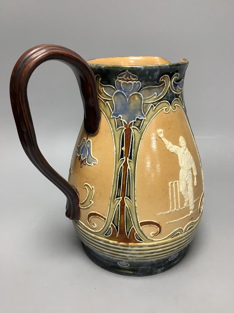 Cricket Interest- A Doulton Lambeth cricketing jug, c.1900, height 20.5cm